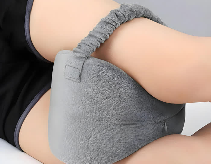 Knee alignment pillow in use