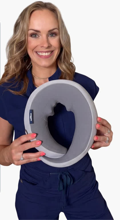 Woman holding the travel neck pillow